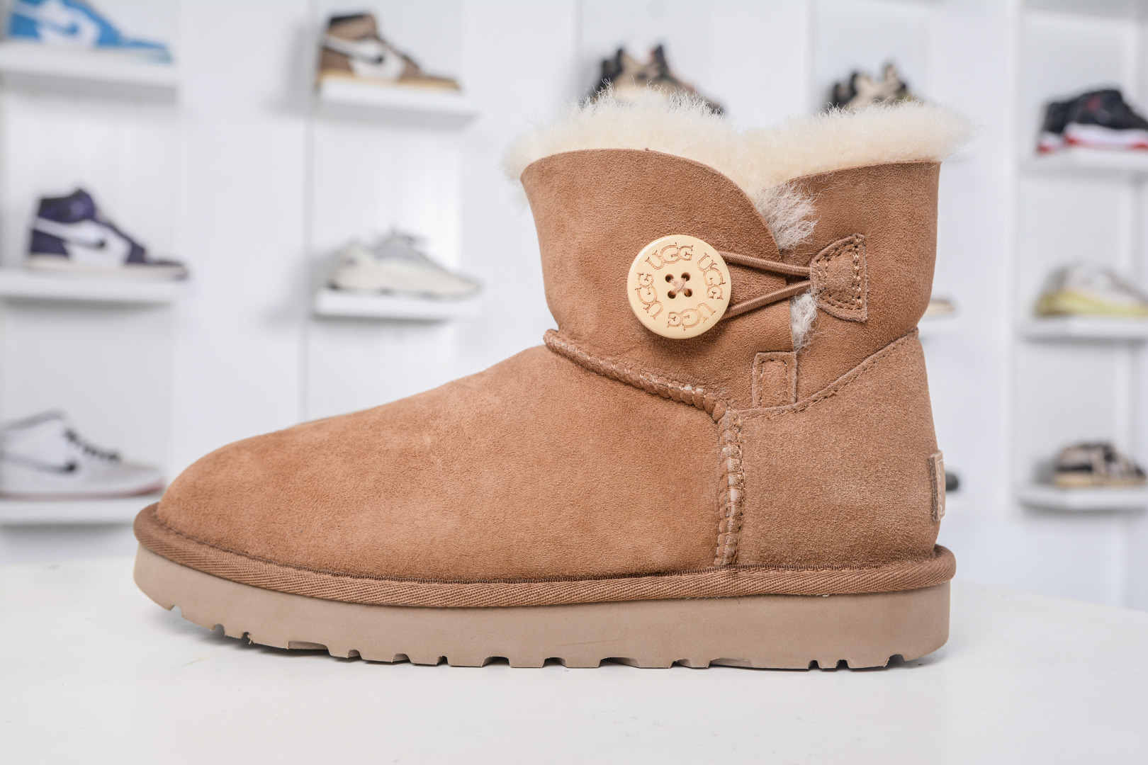 UGG Bailey Mini Boot: Cozy Sheepskin Comfort with Button Detail - Women's Sizes 1 cmp i1758395787643 7984 0 0
