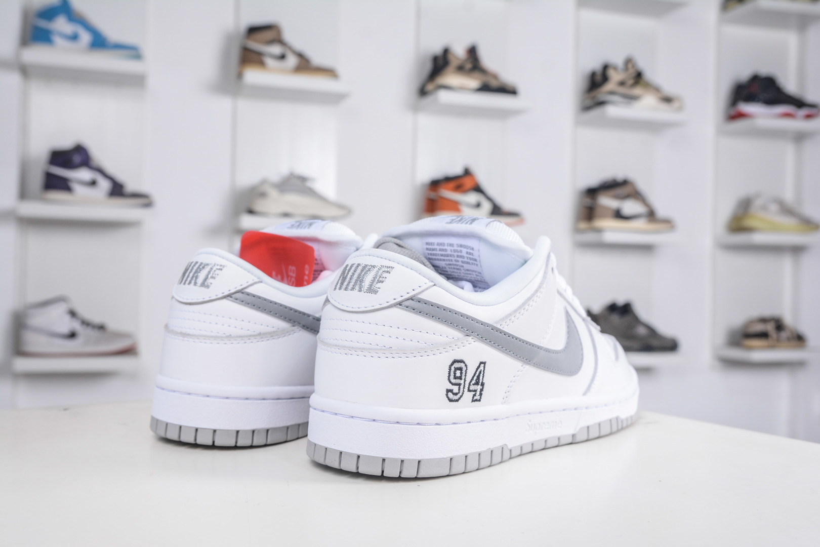Supreme x Nike SB Dunk Low White/Grey Authentic Limited Edition Sneakers 7 cmp i1760718184458 1120 0 5