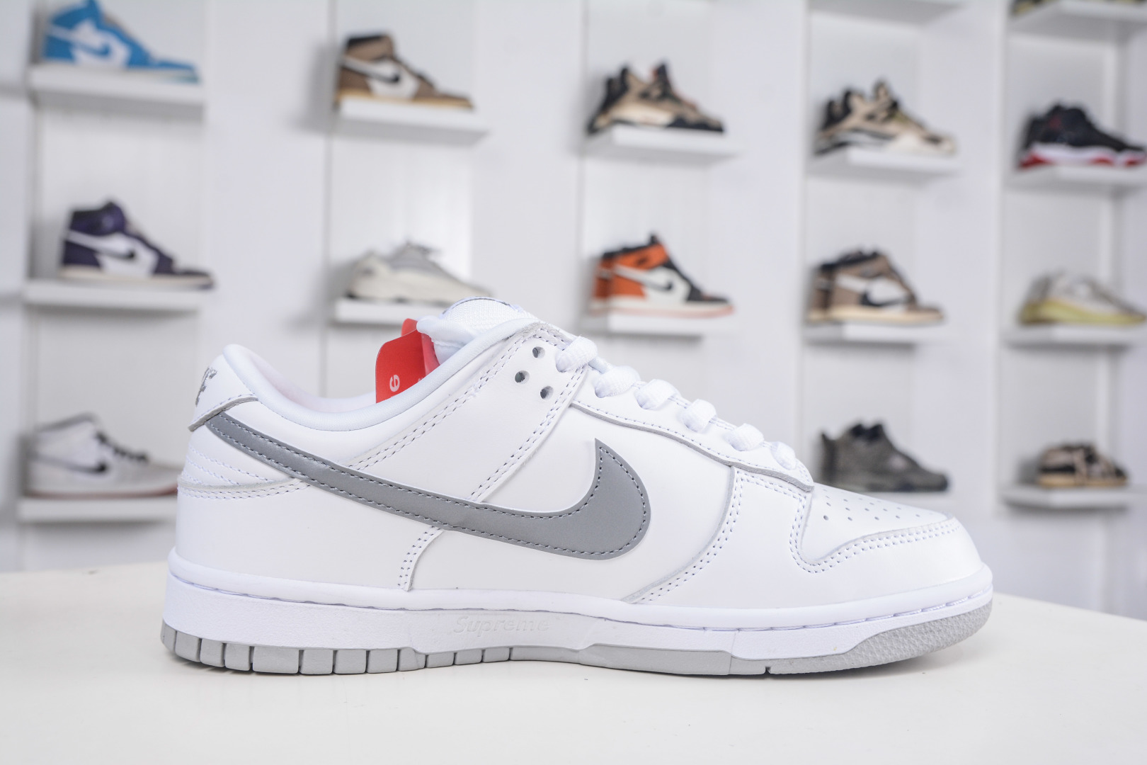 Supreme x Nike SB Dunk Low White/Grey Authentic Limited Edition Sneakers 4 cmp i1760718184469 367 0 2