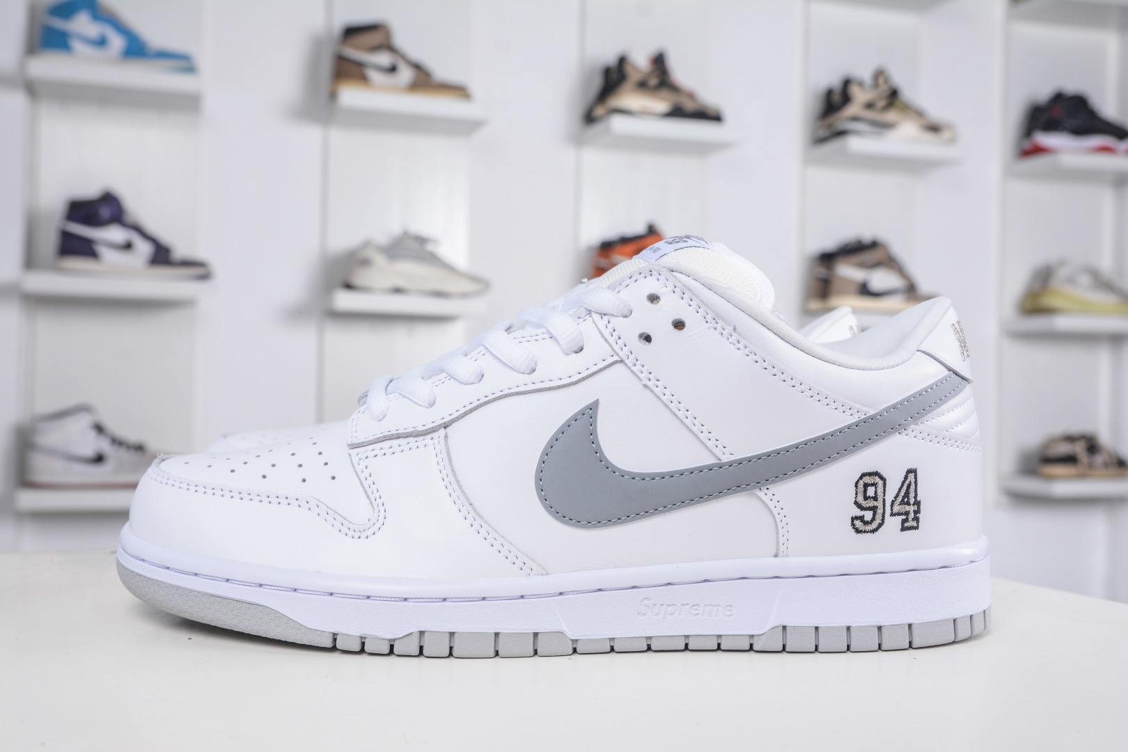 Supreme x Nike SB Dunk Low White/Grey Comfy, Durable Low-Top Sneakers