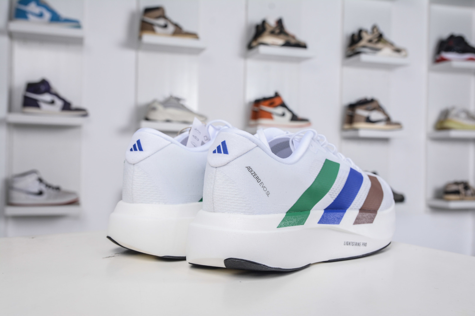 230 AD Adizero EVO SL 马拉松竞速专业跑鞋 CELERMESH针织网面非常轻薄 KI3393