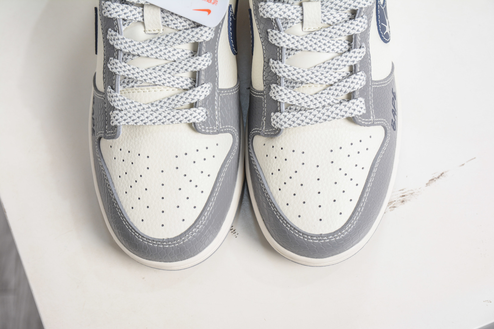 270 Nike SB Dunk Low x BAPE 猿人头联名-米灰黑 JP1628-036
