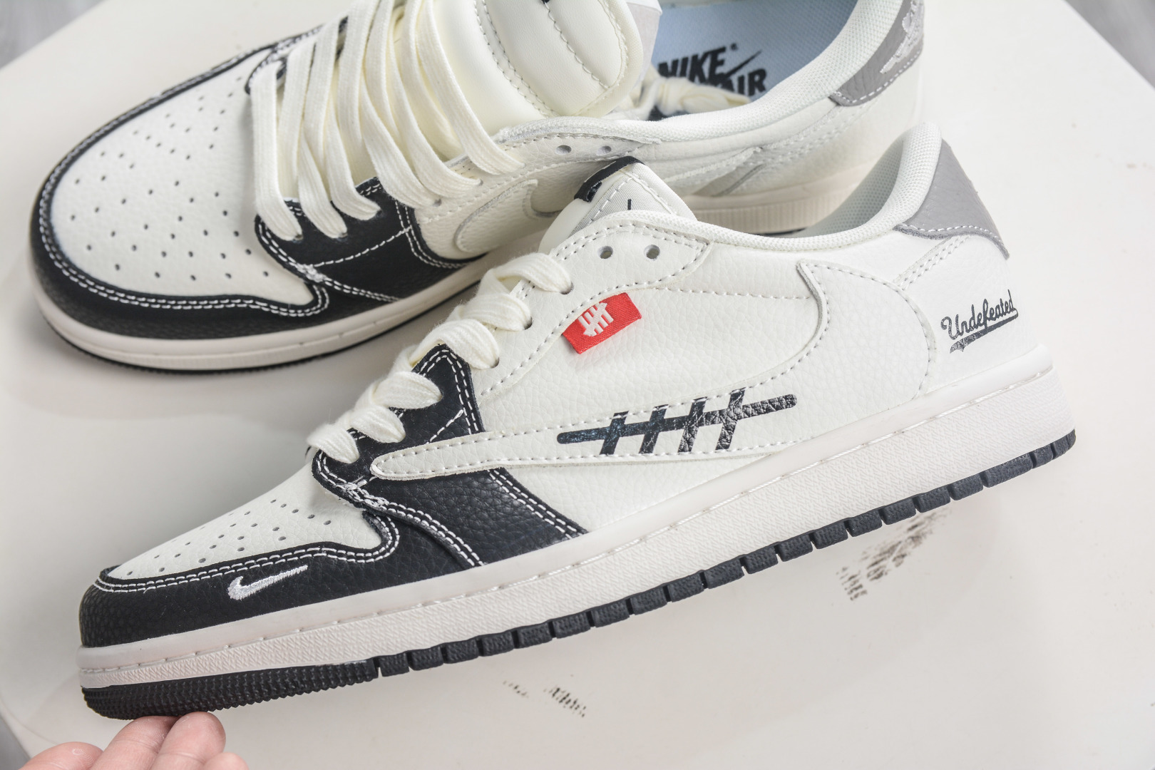 270 TS x Air Jordan AJ1 Low x UNDEFEATED UND联名-米黑灰拼接 倒钩低帮联名定制配色 JW1188-169-Chinese UA Cheap High Quatity Brand Clothes Bags handbags Sneakers wholesale wholesaler seller from China Factory suppliers Fashion Clothing Shoes best Quality Beautiful Price 270 TS x Air Jordan AJ1 Low x UNDEFEATED UND联名-米黑灰拼接 倒钩低帮联名定制配色 JW1188-169