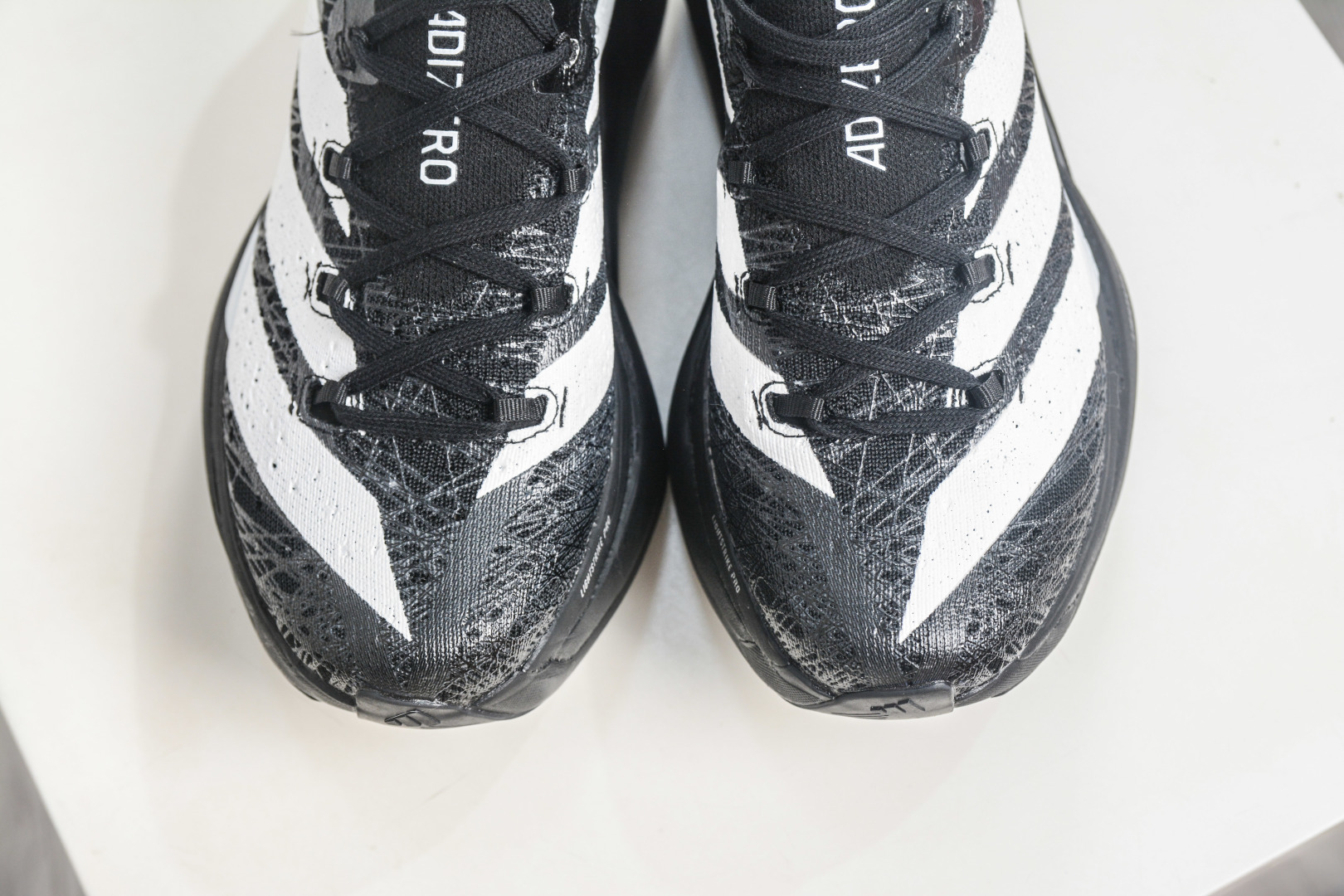 AD Adizero Prime Strung 黑白 马拉松碳板超轻缓震碳柱竞速跑步鞋 JP9194-Top High Quatity Cheap Sneakers Fashion Clothing Clothes Bags handbags Shoes of all Brand wholesale With The best Quality And Beautiful Price from China Factory Chinese suppliers wholesaler seller AD Adizero Prime Strung 黑白 马拉松碳板超轻缓震碳柱竞速跑步鞋 JP9194