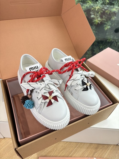 Miu Miu Women's White Leather Platform Sneakers with Pinwheel Details 1 Miu Miu Women's White Leather Platform Sneakers with Pinwheel Details