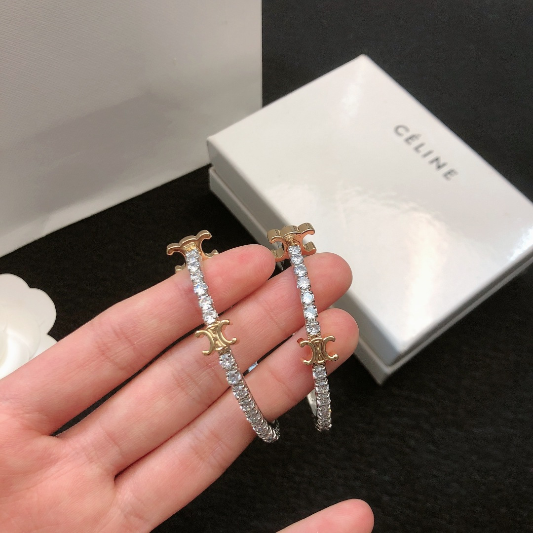Novedad de hoy 🌟 CELINE nuevos pendientes de botón dorados con arco del triunfo lleno de pedrería y círculo plateado, …