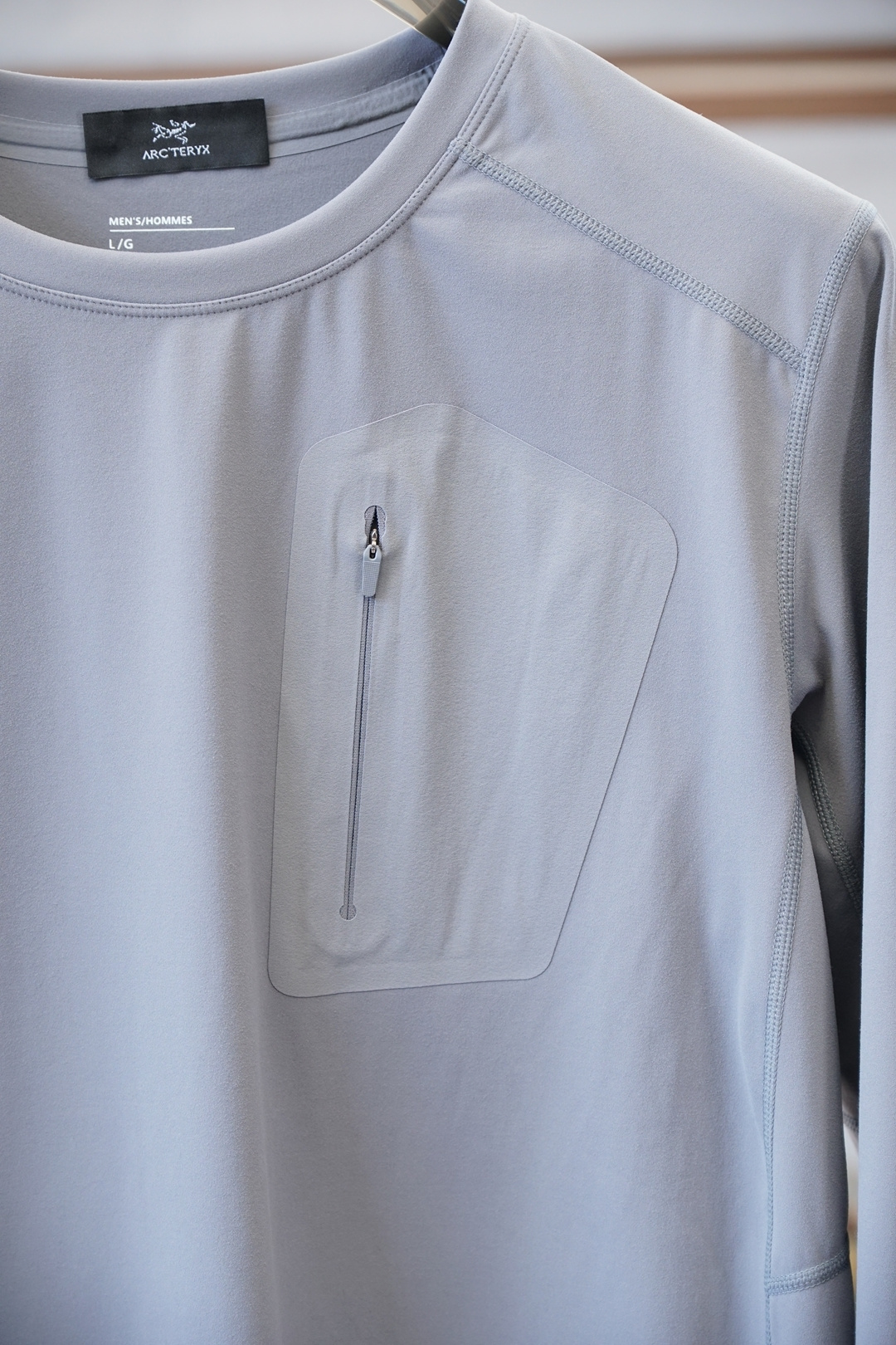 始祖鸟-秋冬户外男士RHO LT系列运动健身休闲弹力超柔轻量针织长袖衫，薄绒内里套头圆领无缝压胶拉链口袋