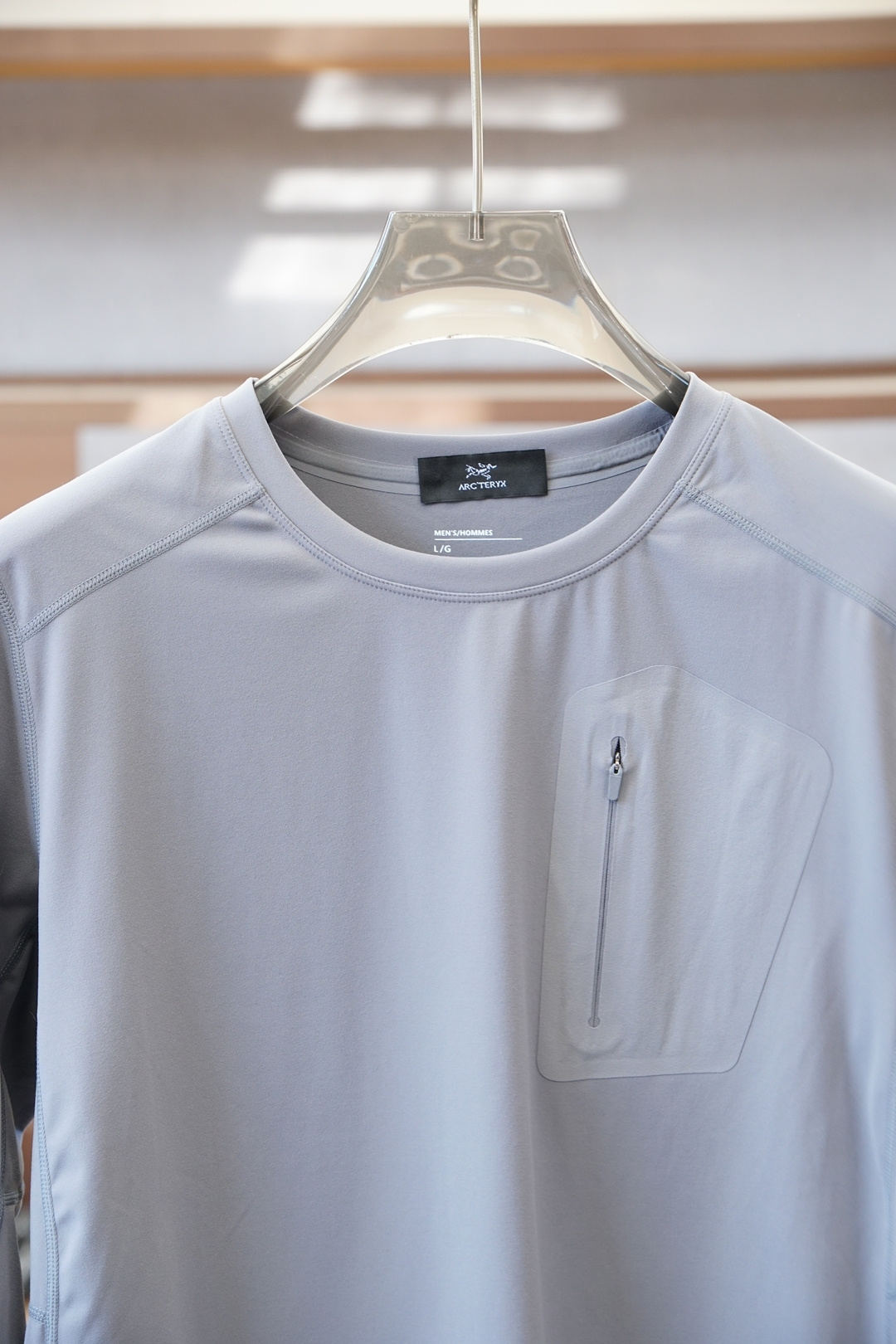 始祖鸟-秋冬户外男士RHO LT系列运动健身休闲弹力超柔轻量针织长袖衫，薄绒内里套头圆领无缝压胶拉链口袋