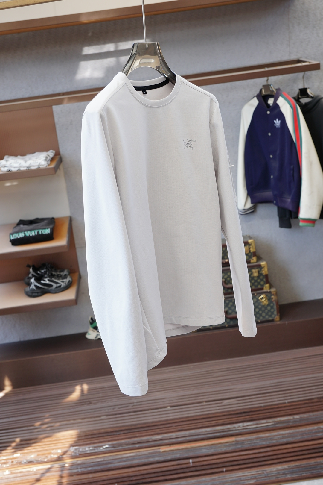 始祖鸟-🍬秋冬户外男士RHO LT系列运动健身休闲弹力超柔轻量针织长袖衫，薄绒内里套头圆领无缝压胶拉链口