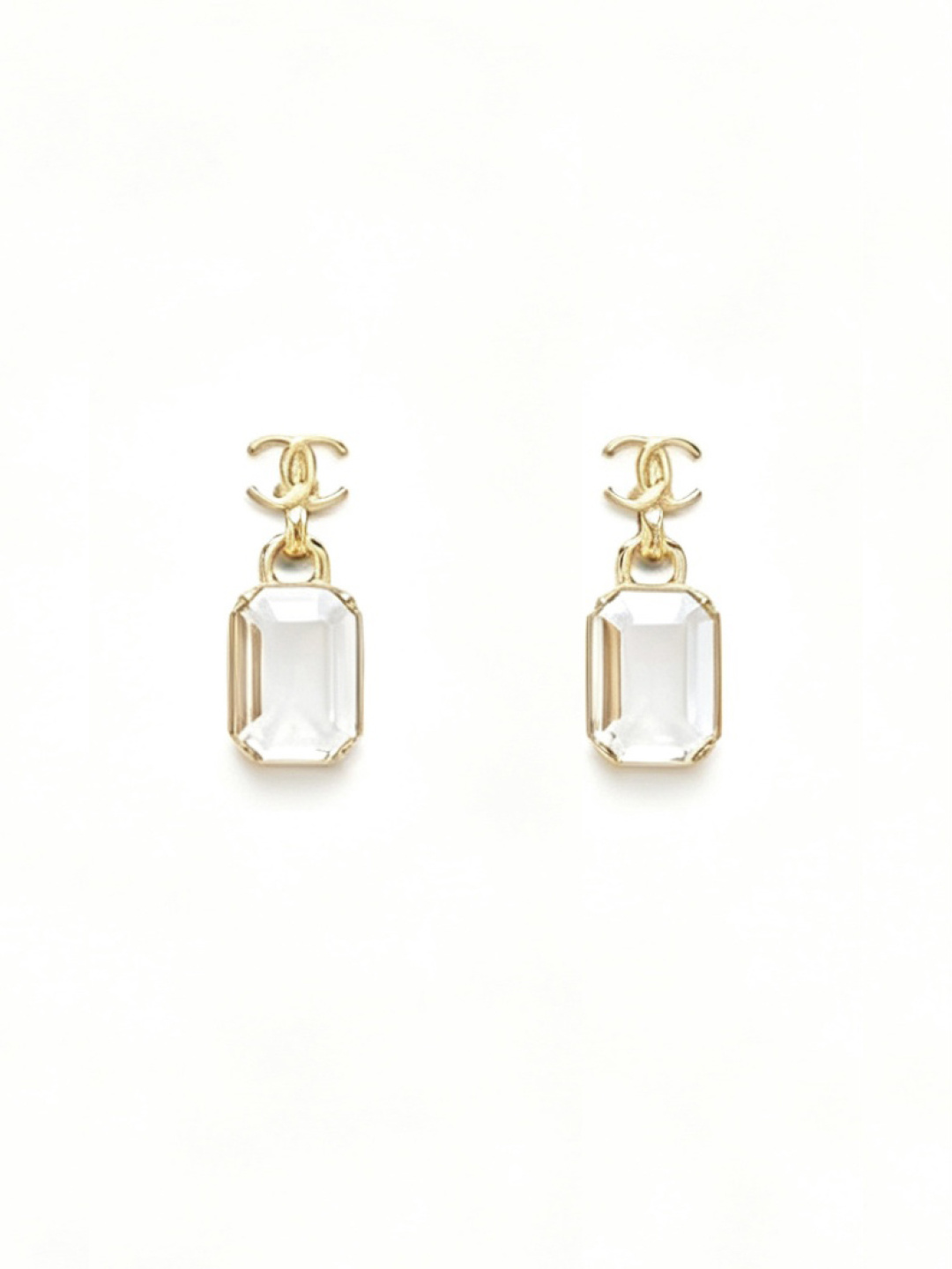 CHANEL Boucles d'oreilles transparentes strass géométriques lettre C