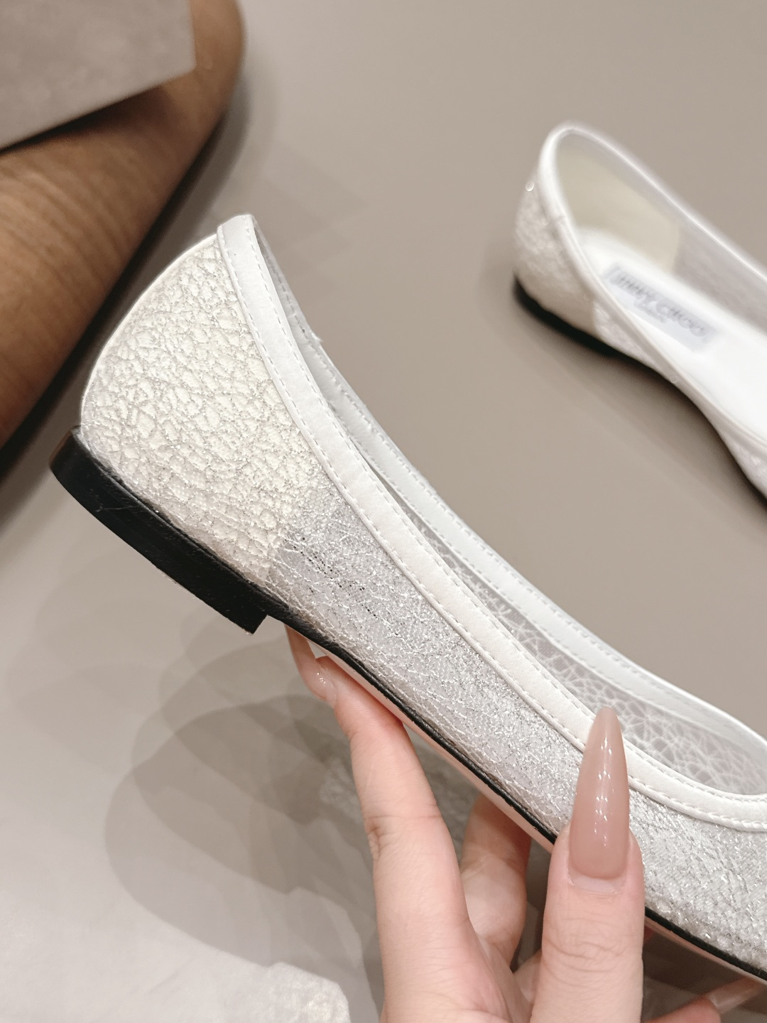 Jimmy Choo Shoe Collection crafted with premium materials and signature 8