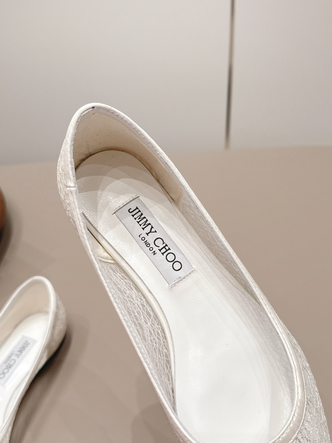 Jimmy Choo Shoe Collection crafted with premium materials and signature 7