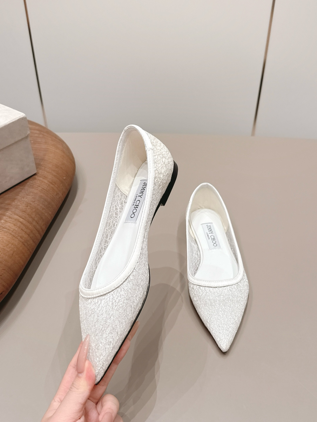 Jimmy Choo Shoe Collection crafted with premium materials and signature 4