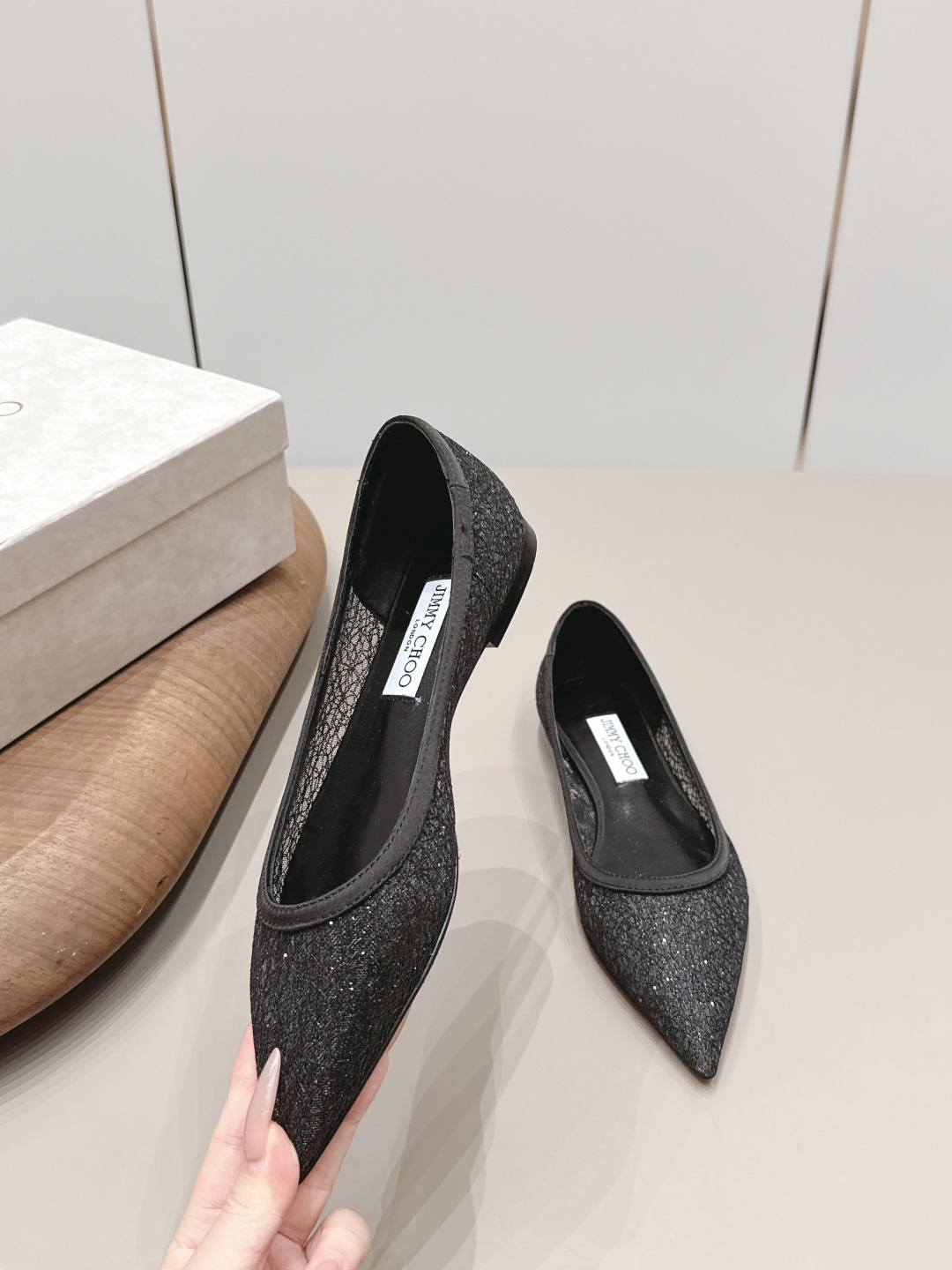 Jimmy Choo Shoe Collection crafted with premium materials and signature 4