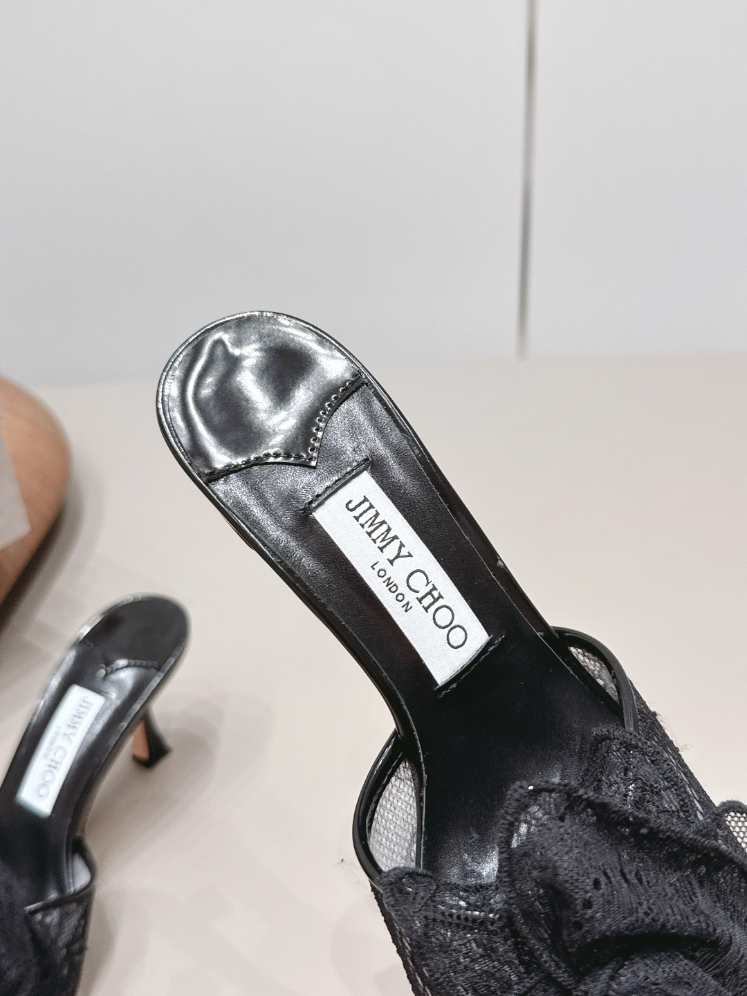 Jimmy Choo Shoe Collection crafted with premium materials and signature 7