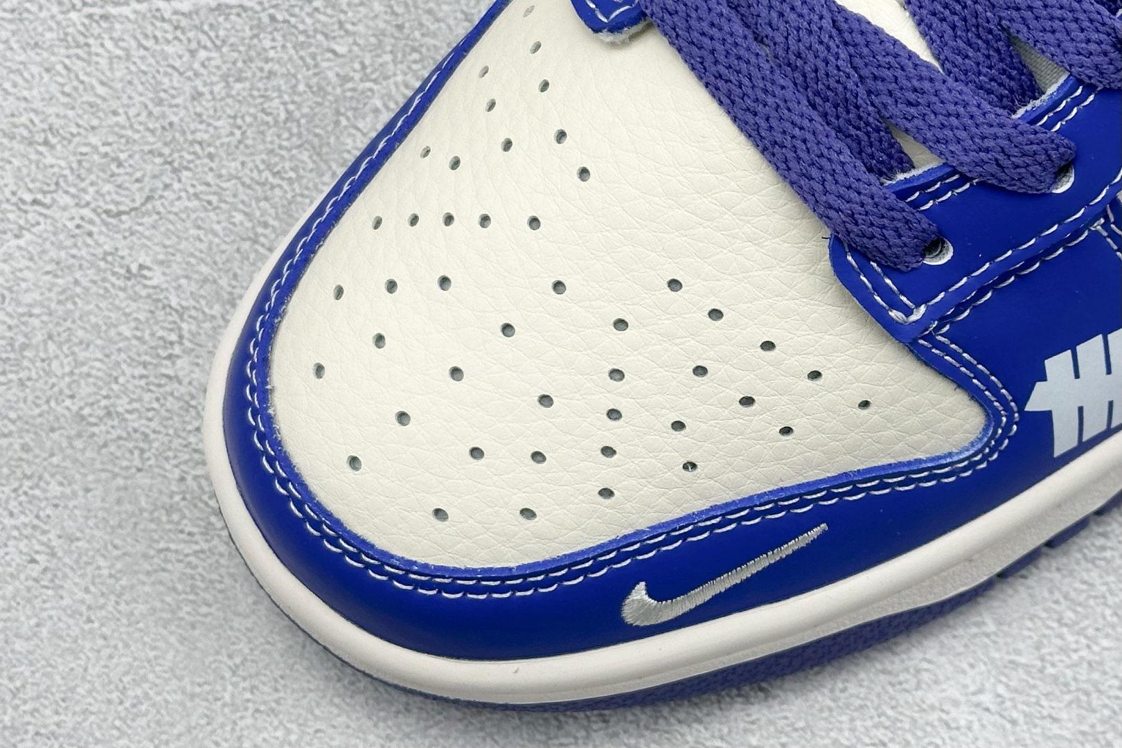  终端放店
XC版 Nike SB Dunk Low UN系列 马赛克蓝勾 周年高端定制 低帮休闲板鞋
