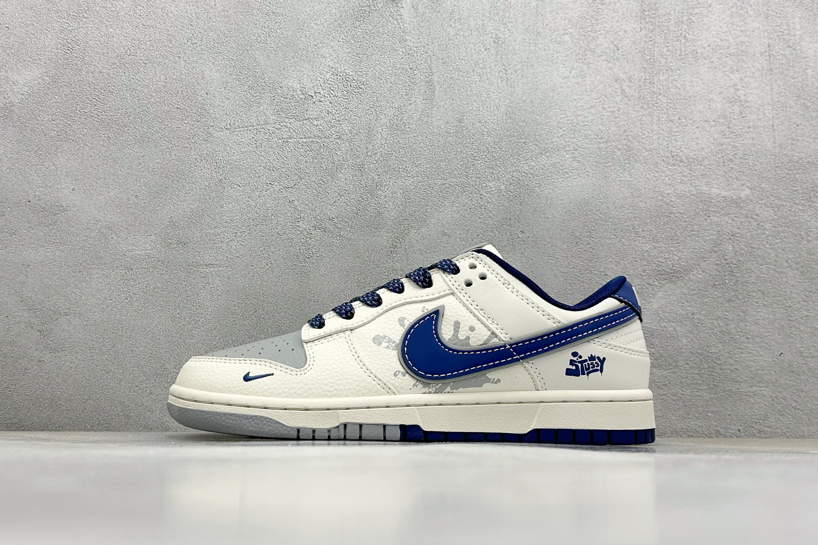 Nike SB Dunk Low 斯图西联名 双拼爆炸蓝勾 周年高端定制 低帮休闲板鞋 XS6089-593