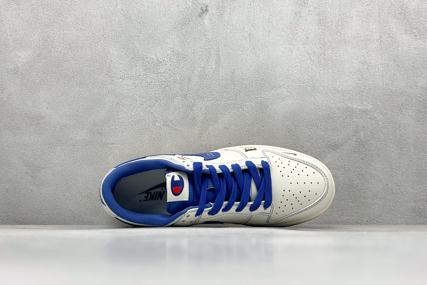 NIKE SB Dunk Low x Champion 冠军白宝蓝 哪吒涂鸦 XX9923-023