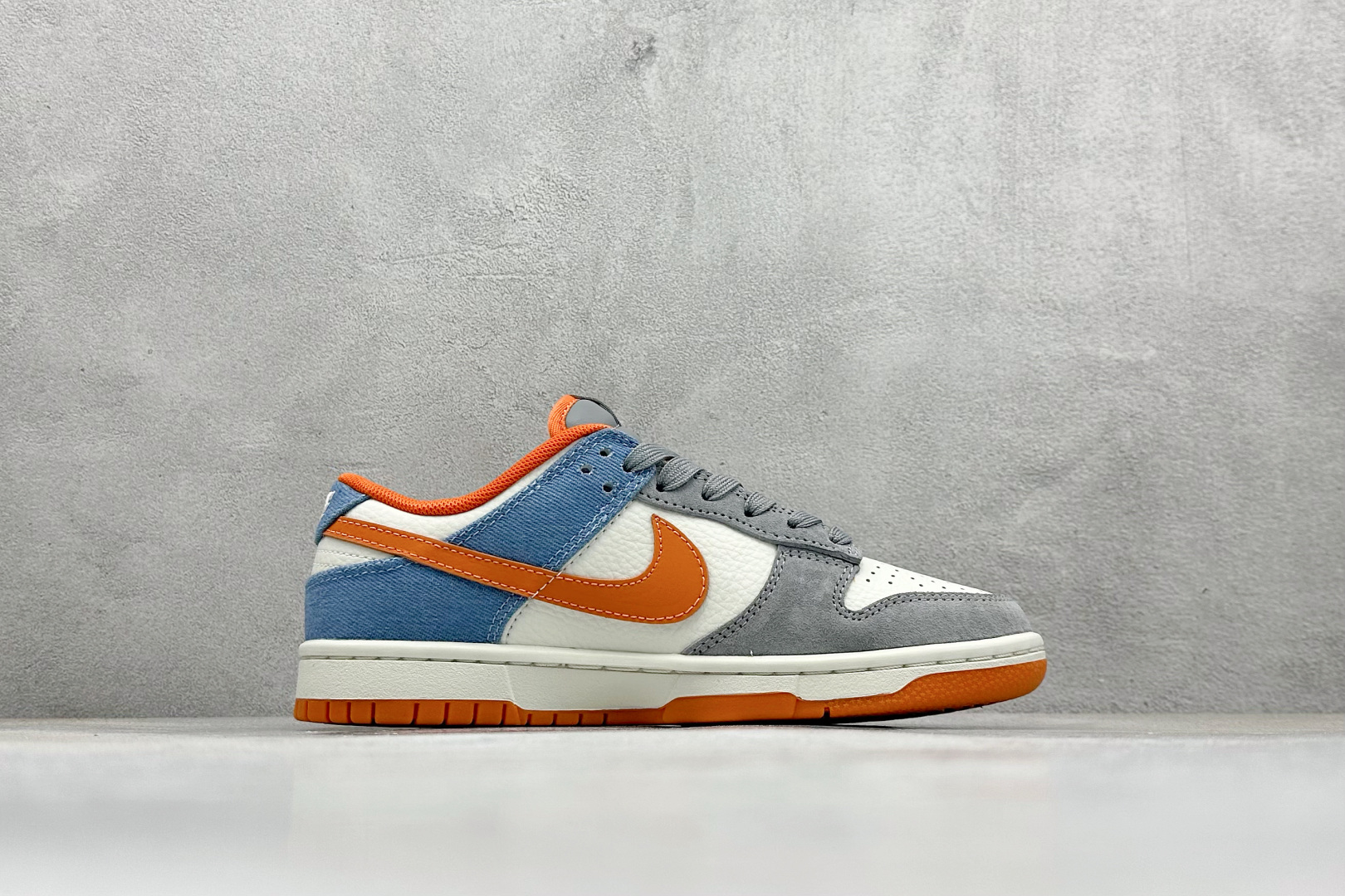 福利特价 
Nk SB Dunk Low 北面联名---白蓝橙勾 周年高端定制 低帮休闲板鞋
#高端定制
