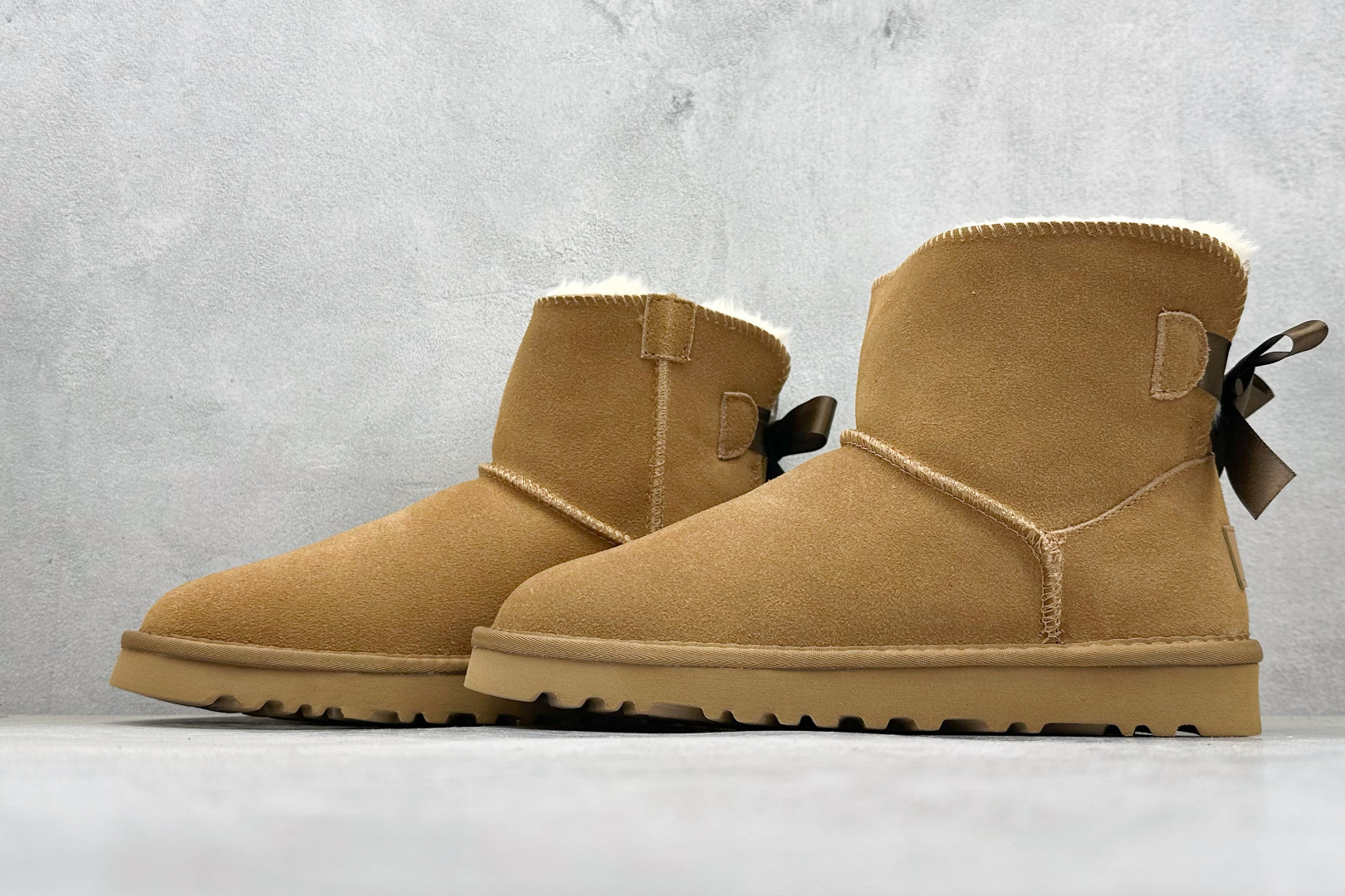 180 UGG经典蝴蝶结短筒雪地靴 官方经典款 15MM外跟+2CM内增高 短筒雪地靴 1016501