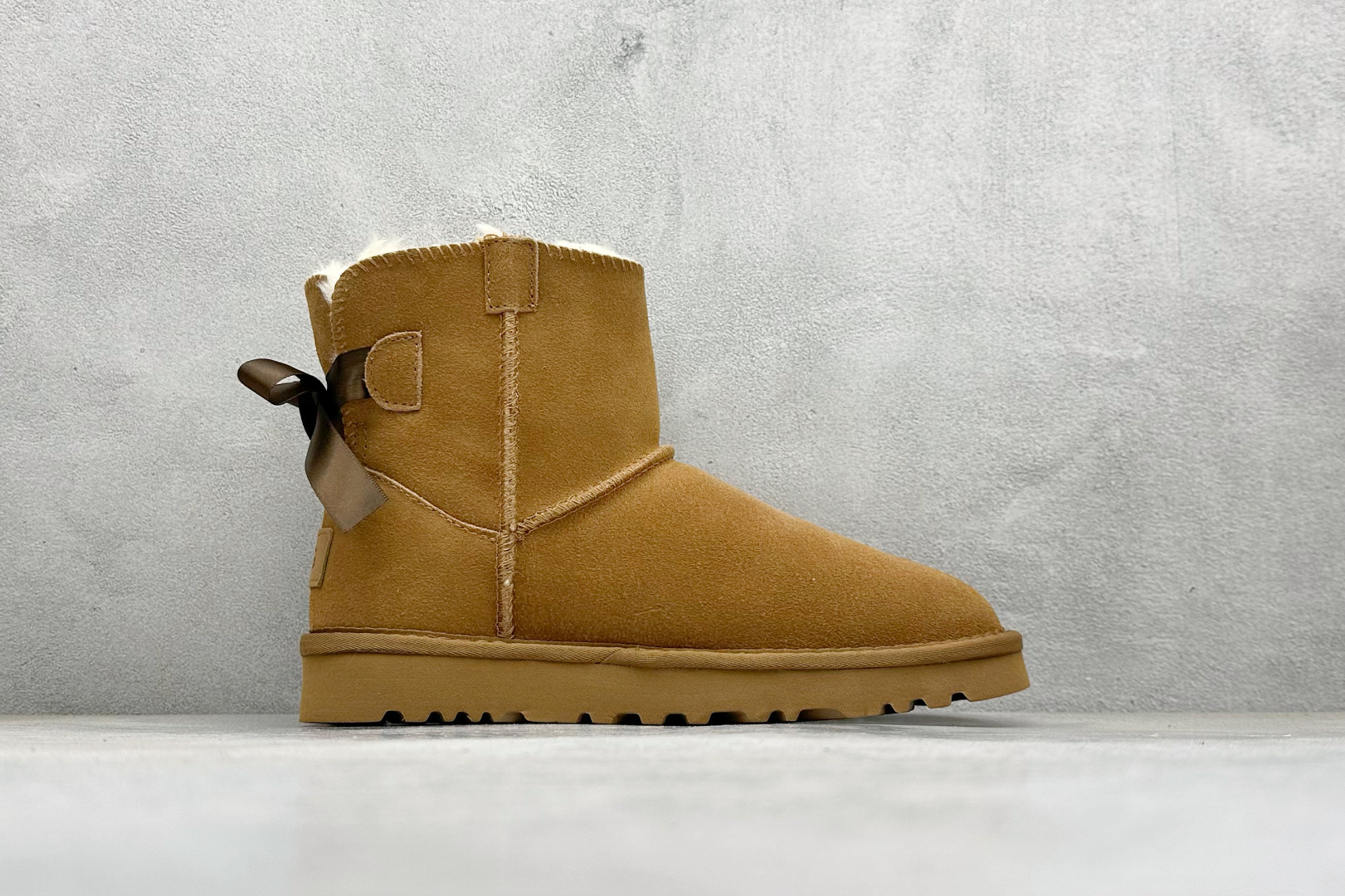 180 UGG经典蝴蝶结短筒雪地靴 官方经典款 15MM外跟+2CM内增高 短筒雪地靴 1016501