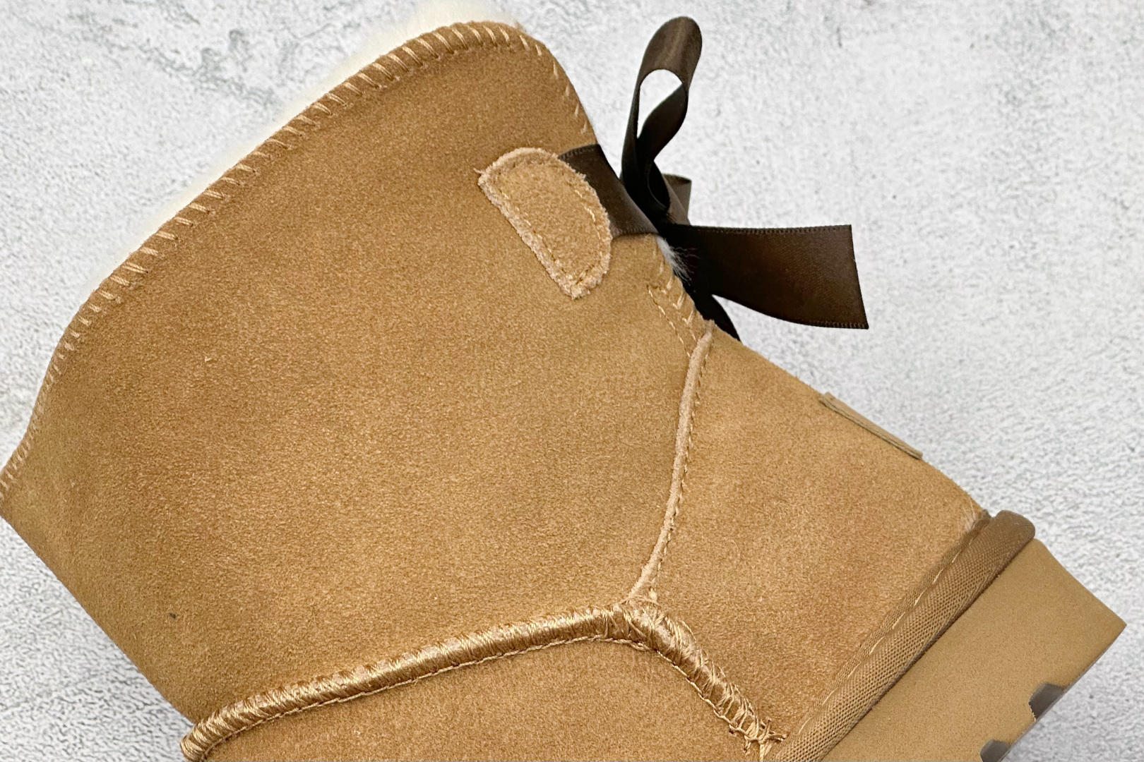 180 UGG经典蝴蝶结短筒雪地靴 官方经典款 15MM外跟+2CM内增高 短筒雪地靴 1016501