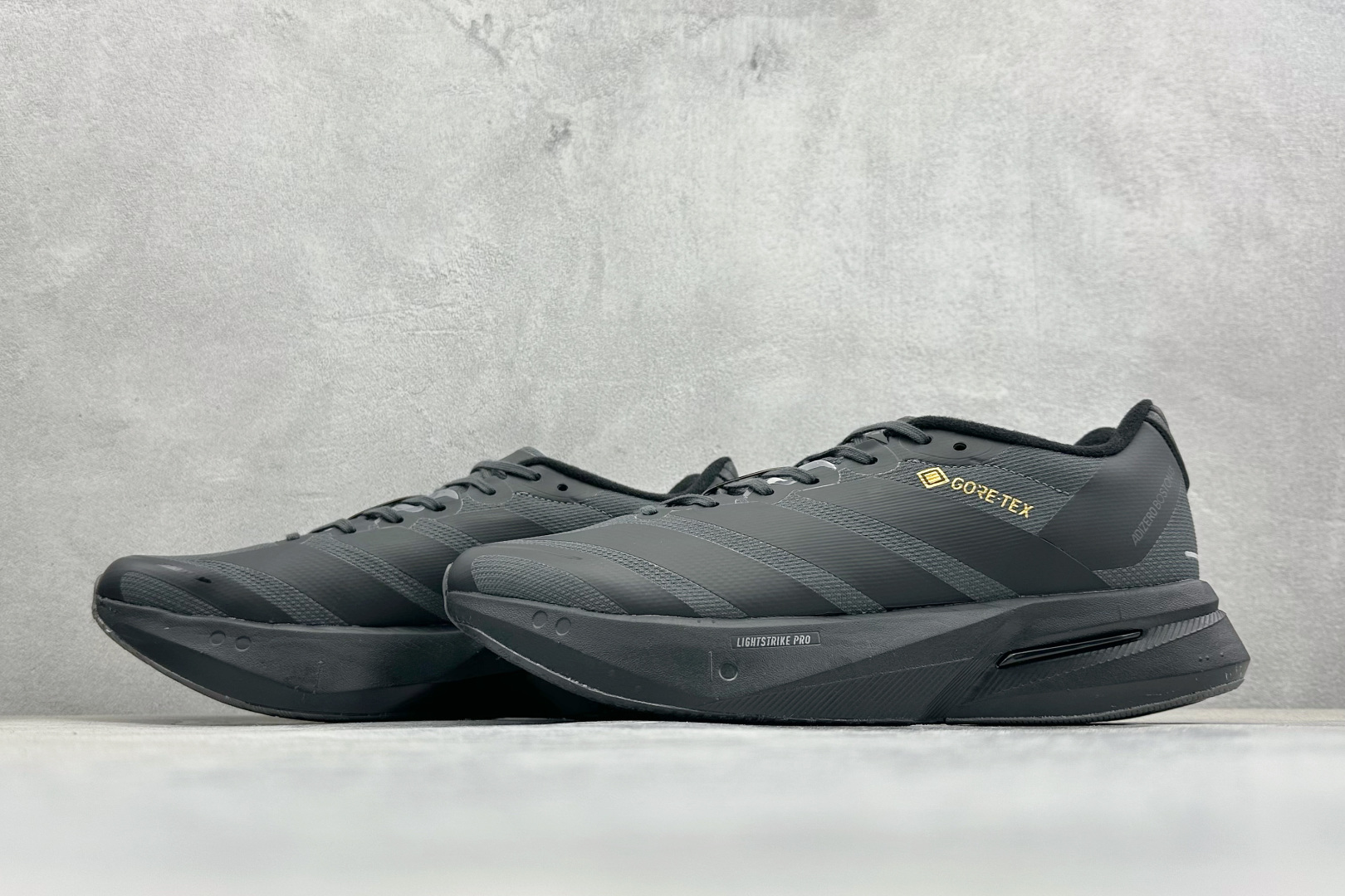 AD Adizero Boston 13 透气网布竞速跑鞋 JQ9830 AD Adizero Boston 13 透气网布竞速跑鞋 JQ9830