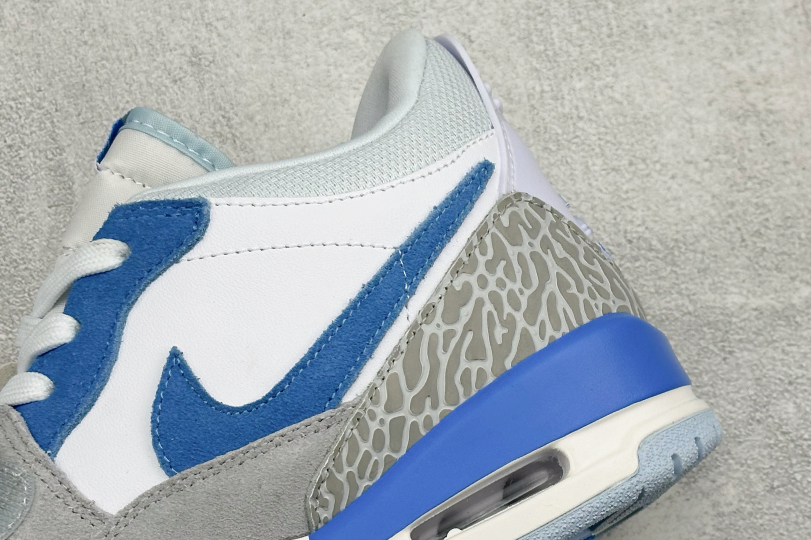 Air Jordan Legacy AJ312 Low 三合一低帮篮球鞋 有着交错结合的设计 它的名字就展现出它所包含的