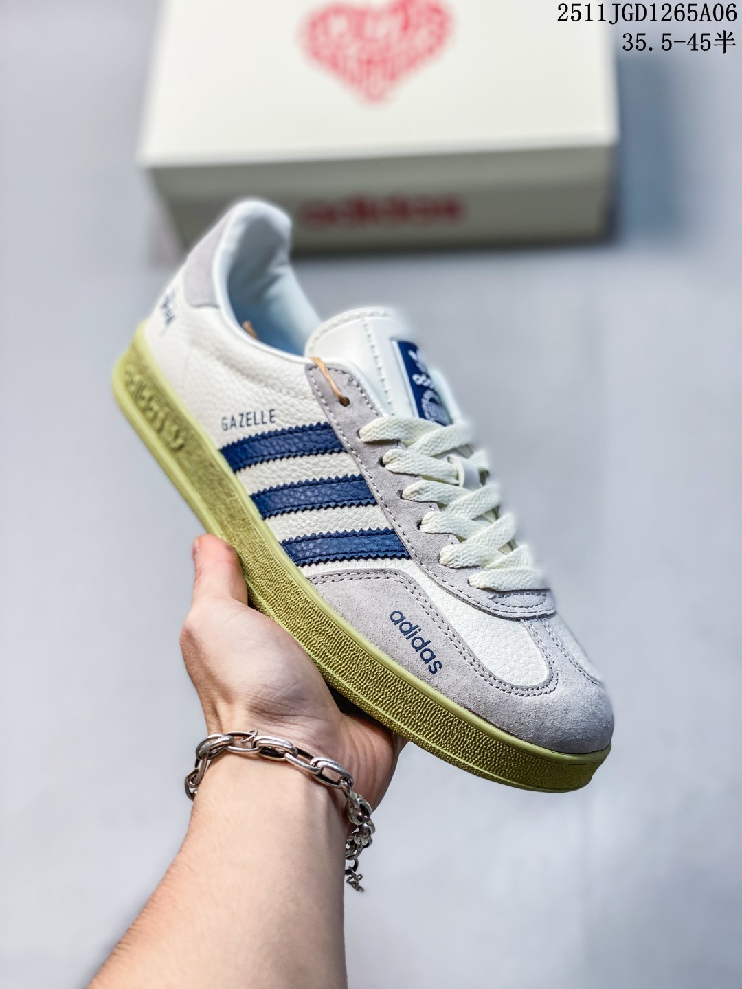 Adidas Gazelle Indoor x Gucci联名款,经典德训鞋型,皮革+麂皮拼接,灰绿蓝黄配色超有活力计.鞋侧有Adidas三条杠和Gucci标志,联名身份感满满!橡胶鞋底抓地力强. JGD1265A06