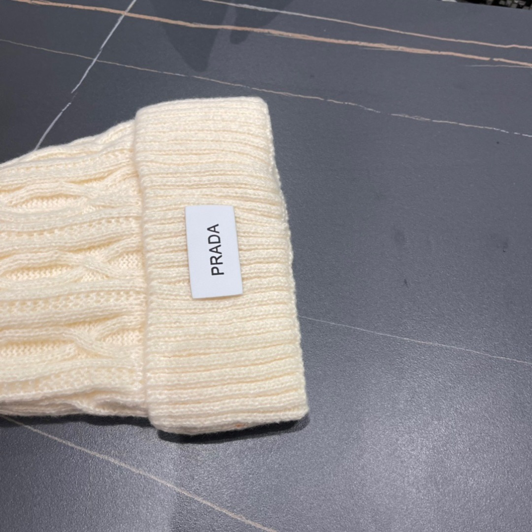  PRADA普拉达 新款毛绒针织帽子女冬保暖护耳显脸小秋冬毛线帽