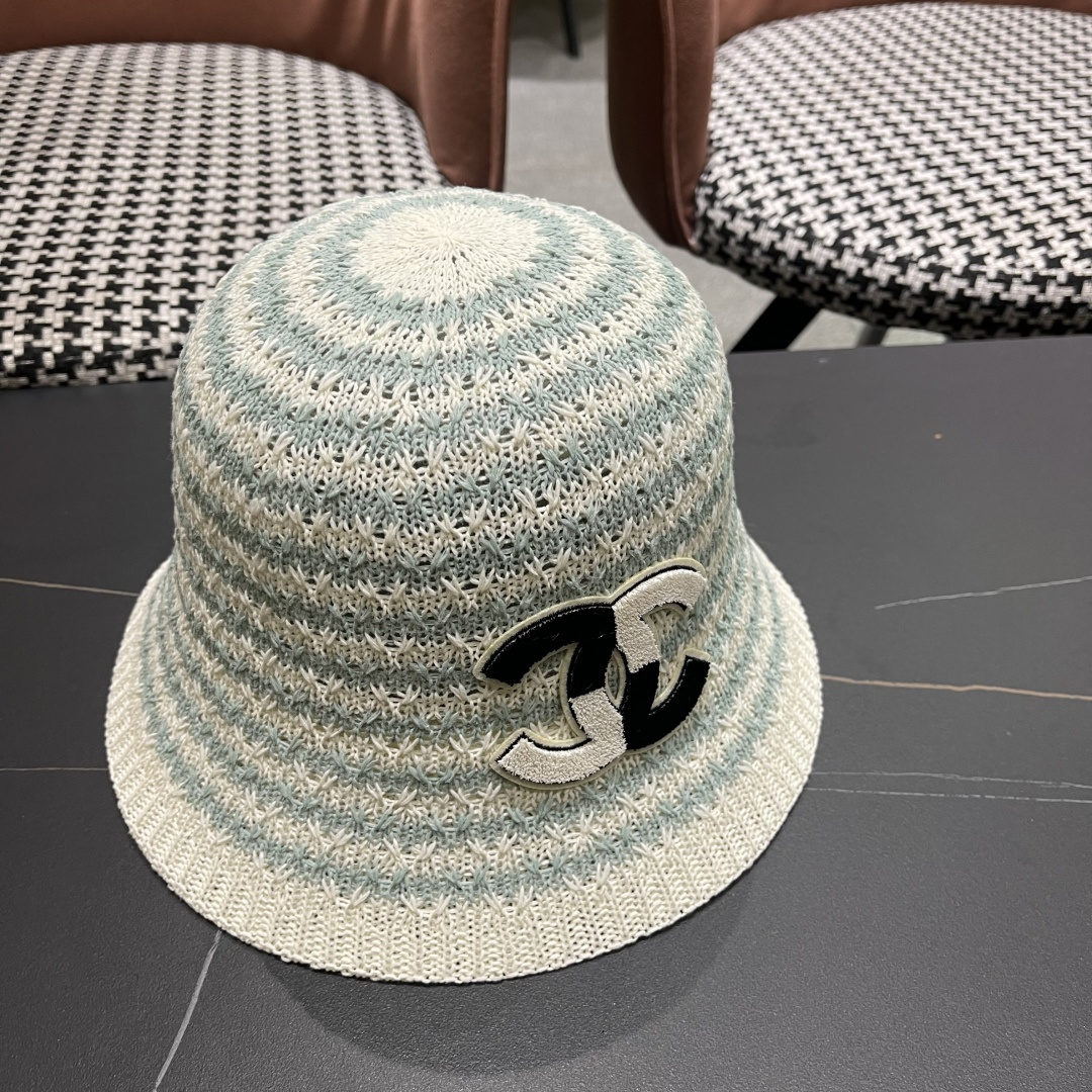  香奈儿Chanel夏季防晒新款镂空彩色条纹遮阳帽海边度假渔夫帽盆帽 