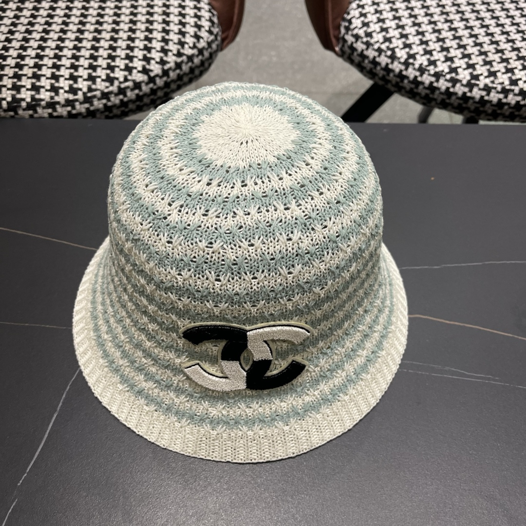  香奈儿Chanel夏季防晒新款镂空彩色条纹遮阳帽海边度假渔夫帽盆帽 