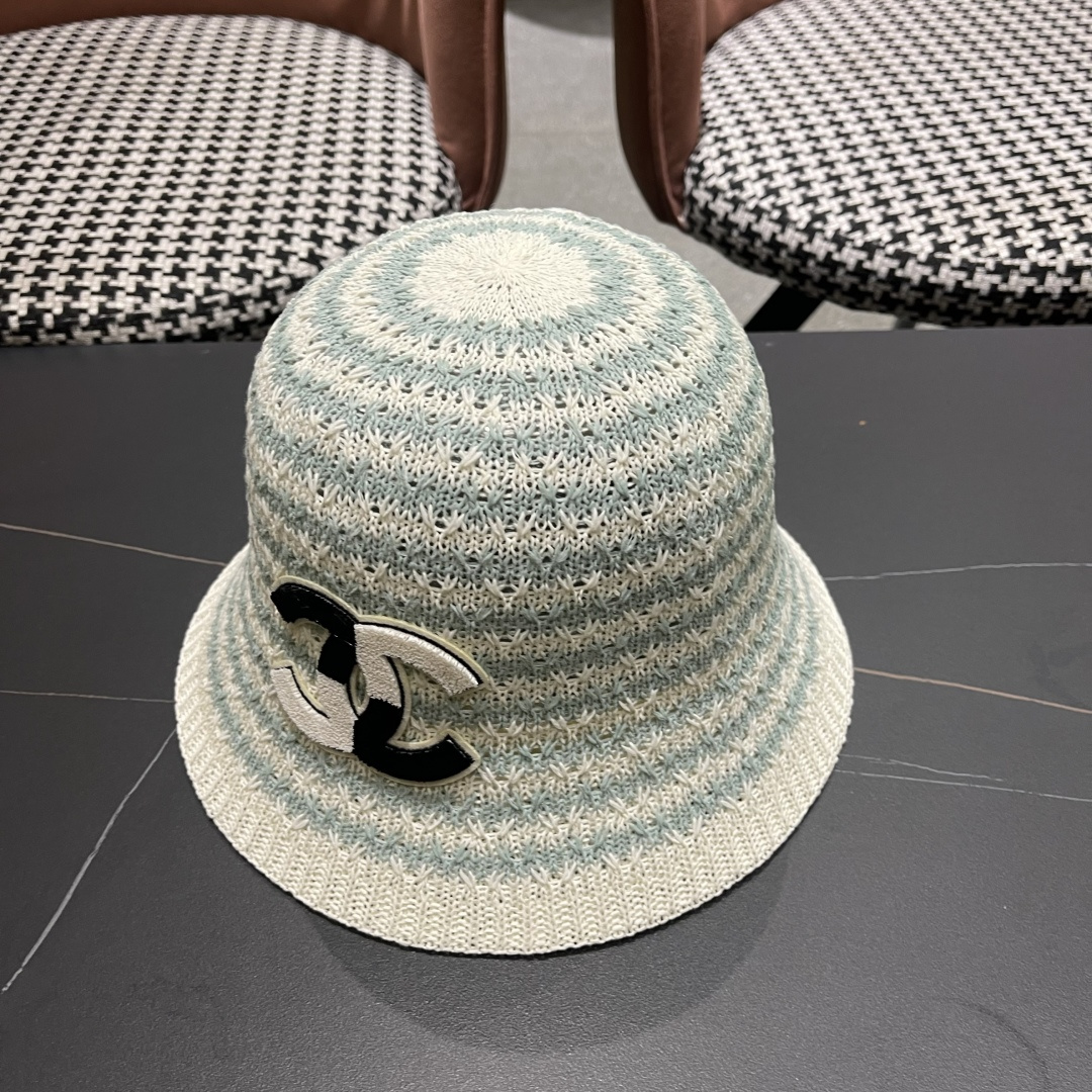  香奈儿Chanel夏季防晒新款镂空彩色条纹遮阳帽海边度假渔夫帽盆帽 