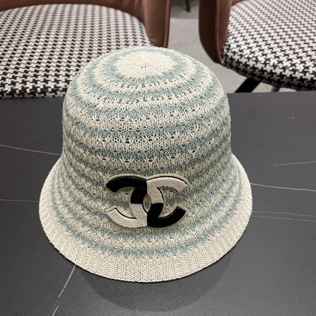  香奈儿Chanel夏季防晒新款镂空彩色条纹遮阳帽海边度假渔夫帽盆帽 