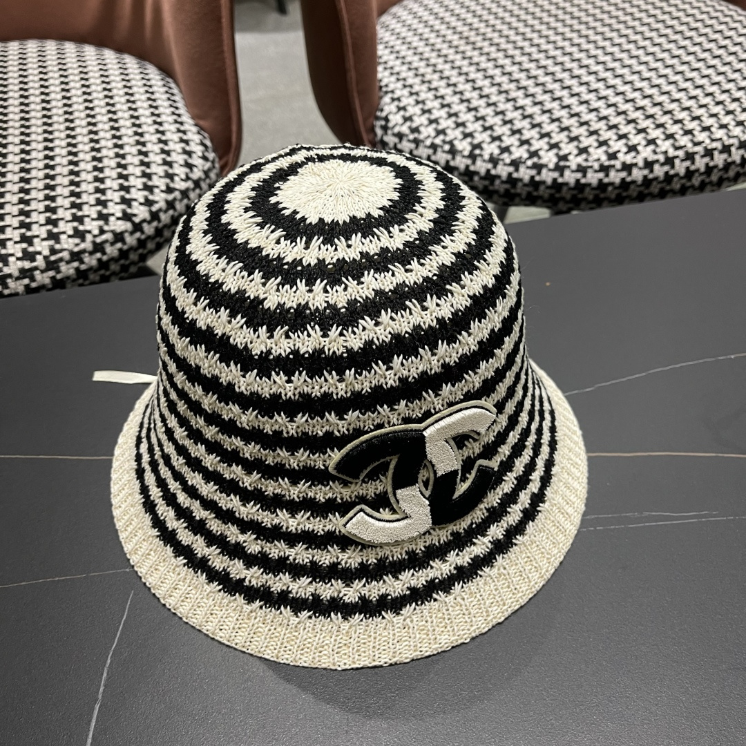  香奈儿Chanel夏季防晒新款镂空彩色条纹遮阳帽海边度假渔夫帽盆帽 