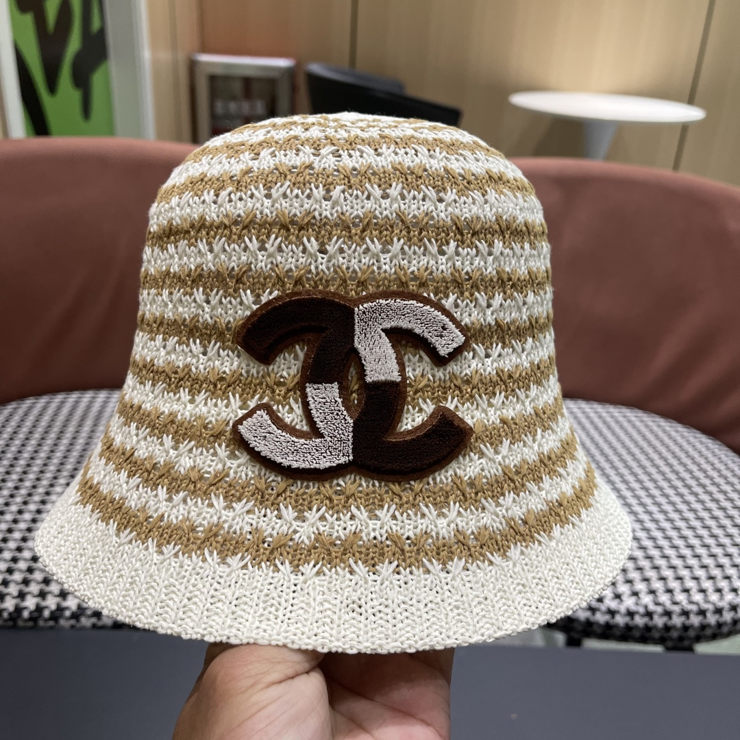  香奈儿Chanel夏季防晒新款镂空彩色条纹遮阳帽海边度假渔夫帽盆帽 