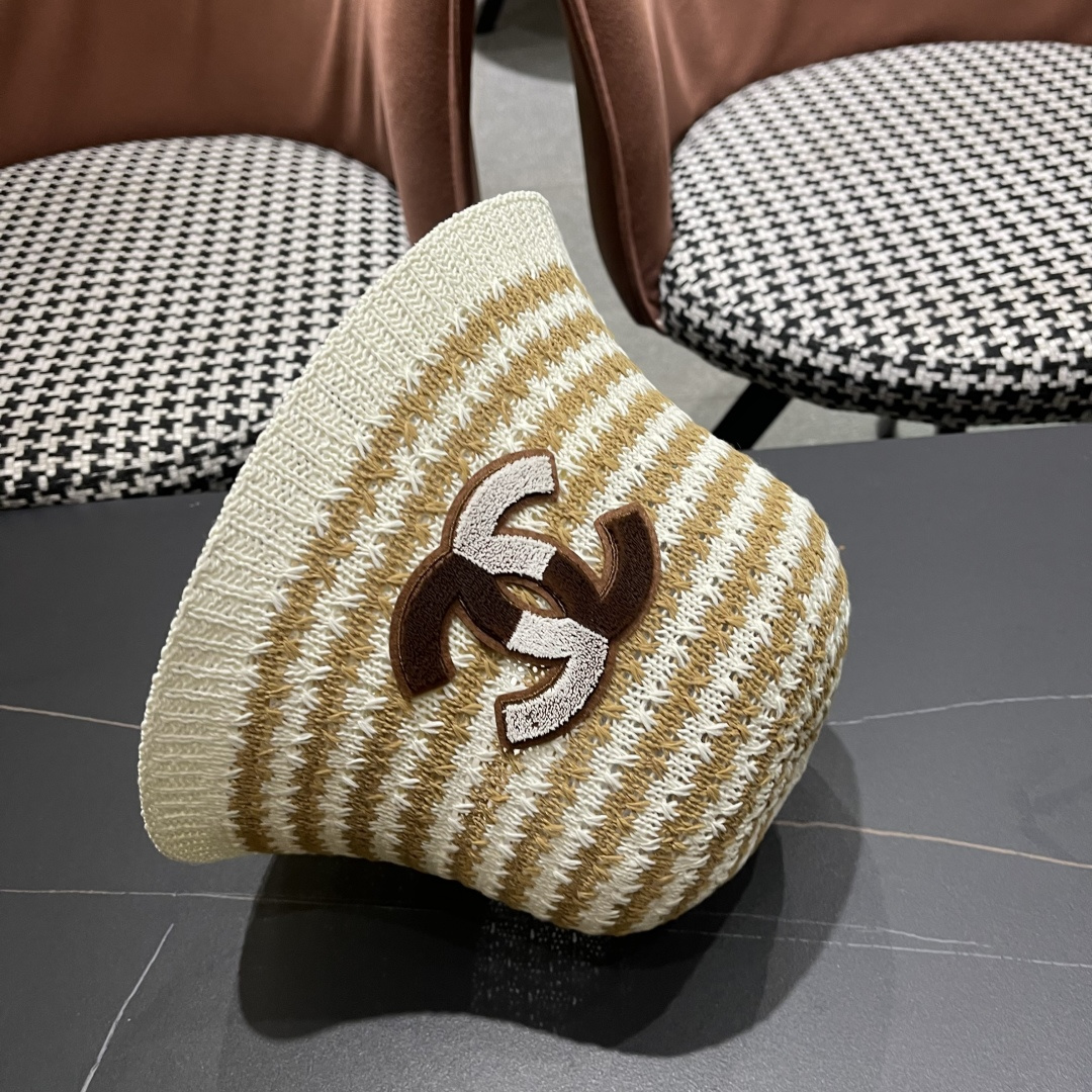  香奈儿Chanel夏季防晒新款镂空彩色条纹遮阳帽海边度假渔夫帽盆帽 