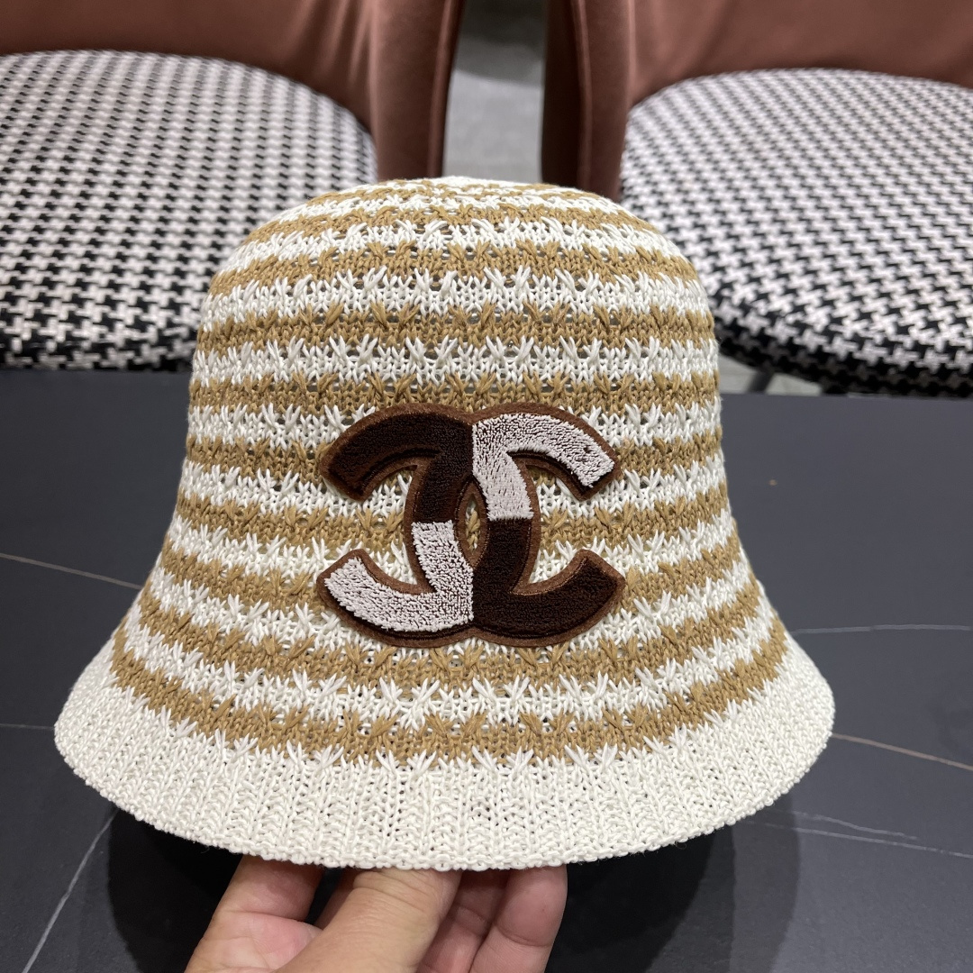  香奈儿Chanel夏季防晒新款镂空彩色条纹遮阳帽海边度假渔夫帽盆帽 