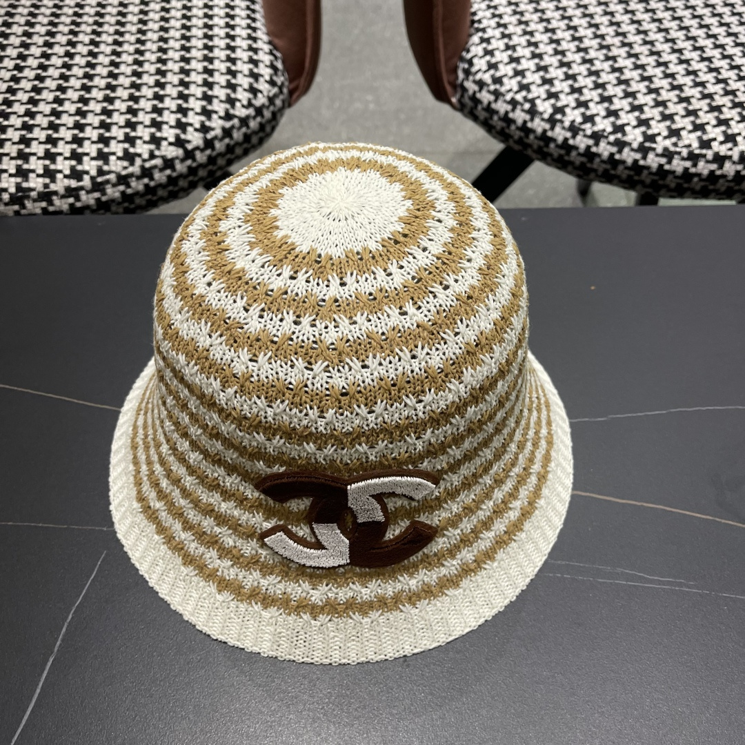  香奈儿Chanel夏季防晒新款镂空彩色条纹遮阳帽海边度假渔夫帽盆帽 