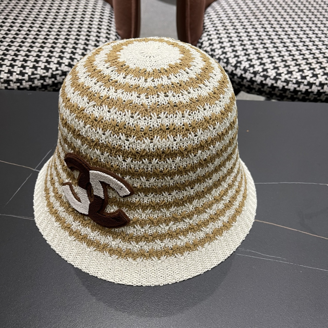  香奈儿Chanel夏季防晒新款镂空彩色条纹遮阳帽海边度假渔夫帽盆帽 