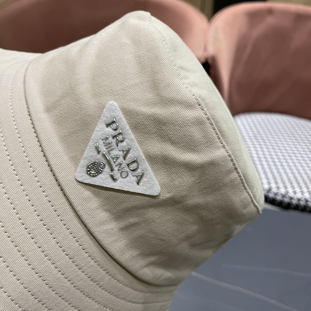  普拉达Prada 2025春夏季百搭渔夫帽女夏小帽檐平顶盆帽子