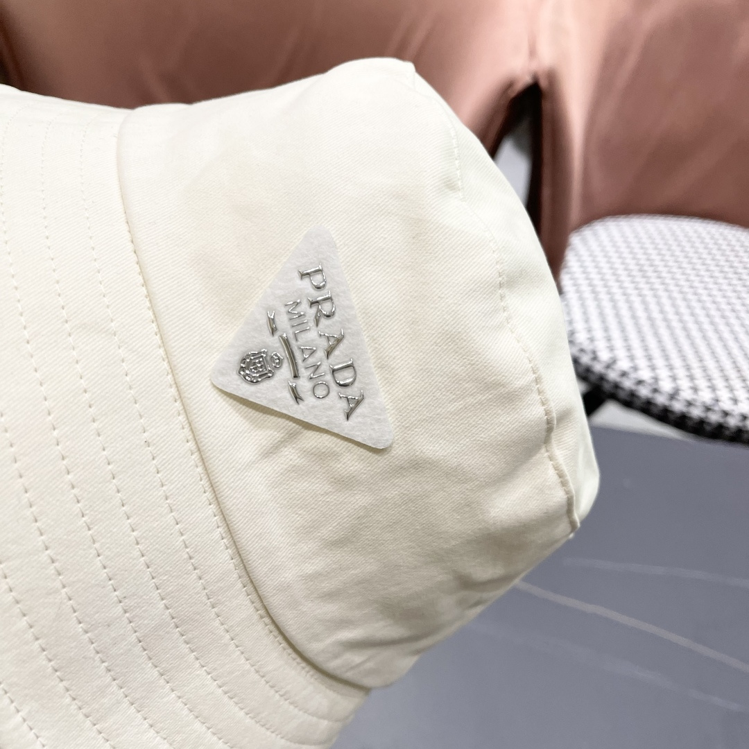  普拉达Prada 2025春夏季百搭渔夫帽女夏小帽檐平顶盆帽子