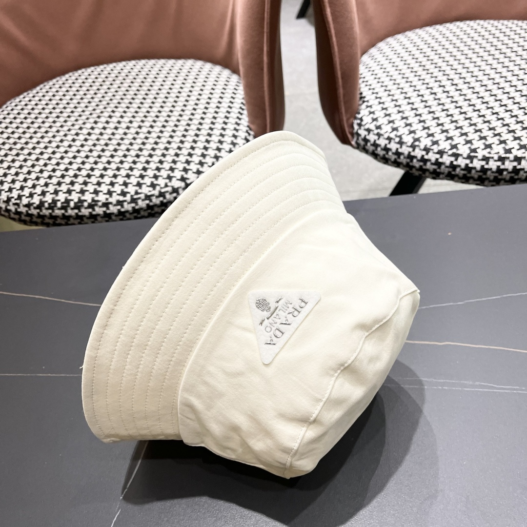  普拉达Prada 2025春夏季百搭渔夫帽女夏小帽檐平顶盆帽子