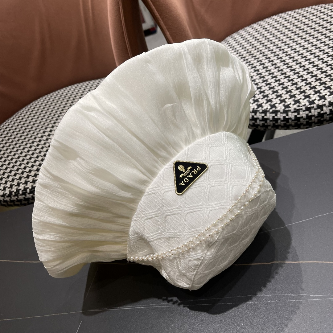  普拉达Prada韩版薄纱渔夫帽女款春夏出游优雅百搭可折叠防晒遮阳帽