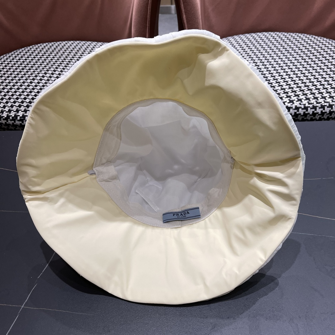  普拉达Prada韩版薄纱渔夫帽女款春夏出游优雅百搭可折叠防晒遮阳帽