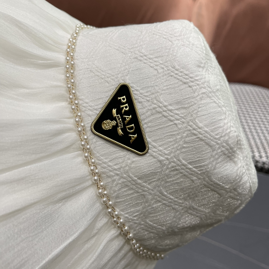  普拉达Prada韩版薄纱渔夫帽女款春夏出游优雅百搭可折叠防晒遮阳帽