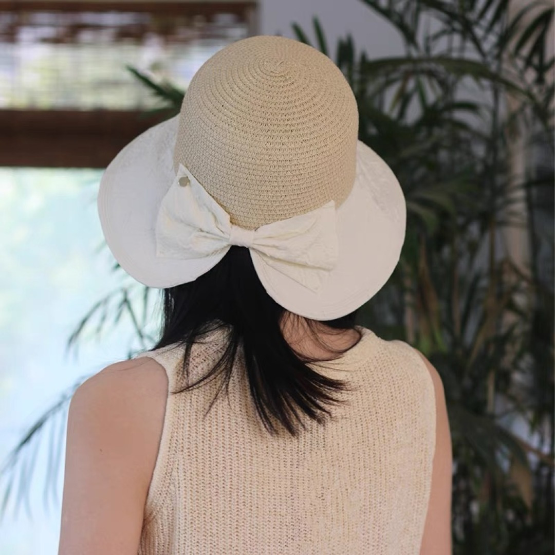  Chanel香奈儿日系优雅开叉蝴蝶结渔夫帽布草拼接大檐遮阳帽太
阳帽可折叠草帽潮