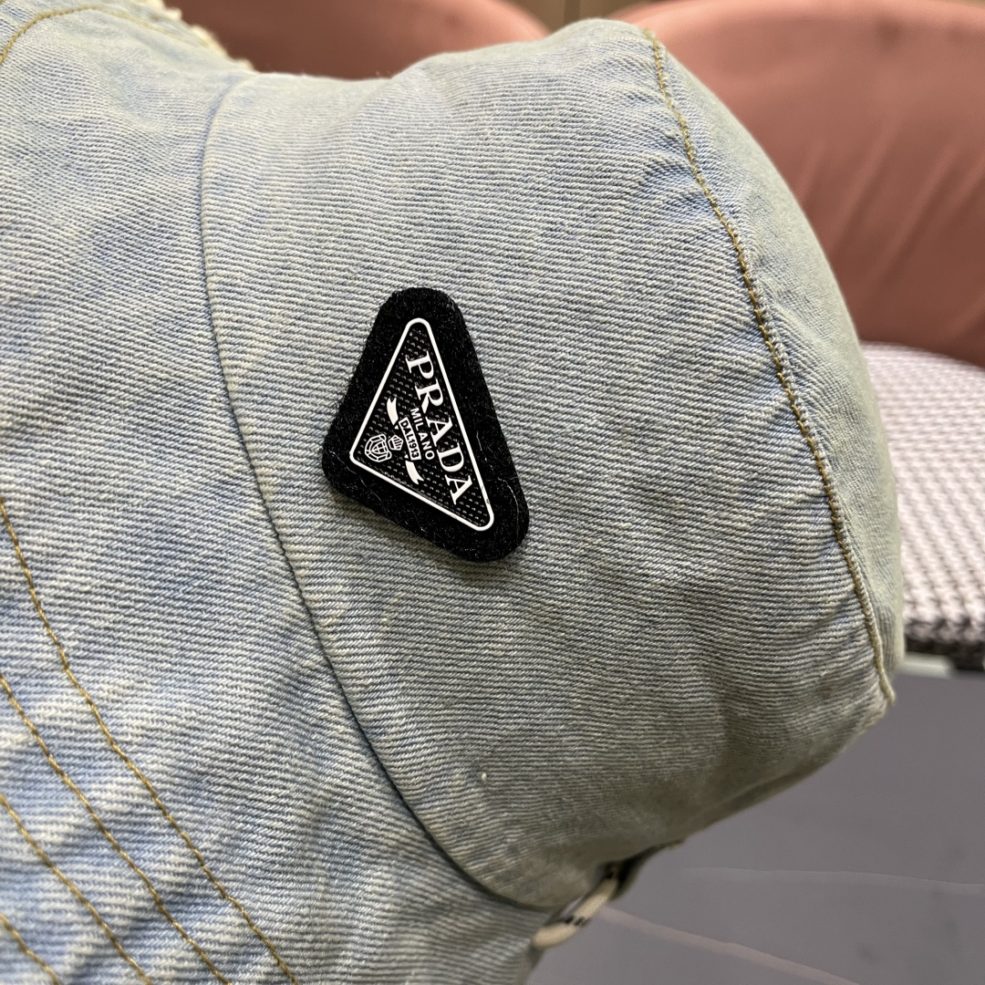  PRADA 普拉达 潮韩版牛仔帽子毛边简约渔夫帽男女春夏季时
尚休闲百搭遮阳防晒帽