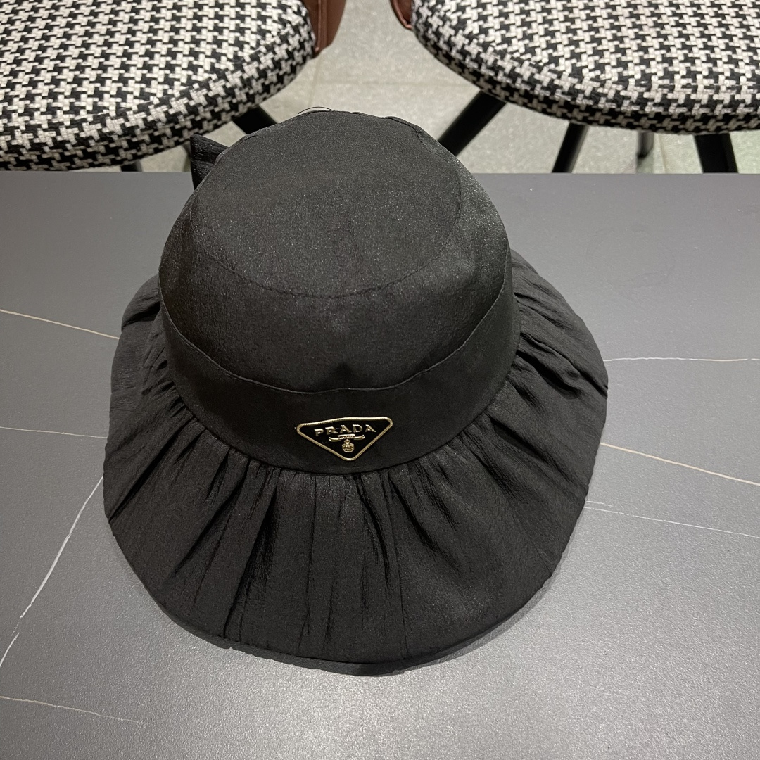  Prada普拉达 2025新款春夏季新款蝴蝶结大沿盆帽女户外出游时尚百
搭渔夫帽休闲旅游帽子