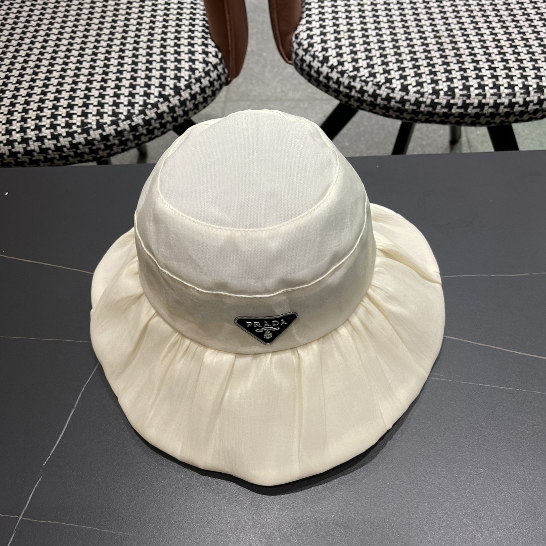  Prada普拉达 2025新款春夏季新款蝴蝶结大沿盆帽女户外出游时尚百
搭渔夫帽休闲旅游帽子